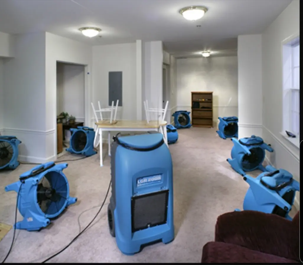 Air movers and dehumidifier setup for Water Extraction & Removal in Berea